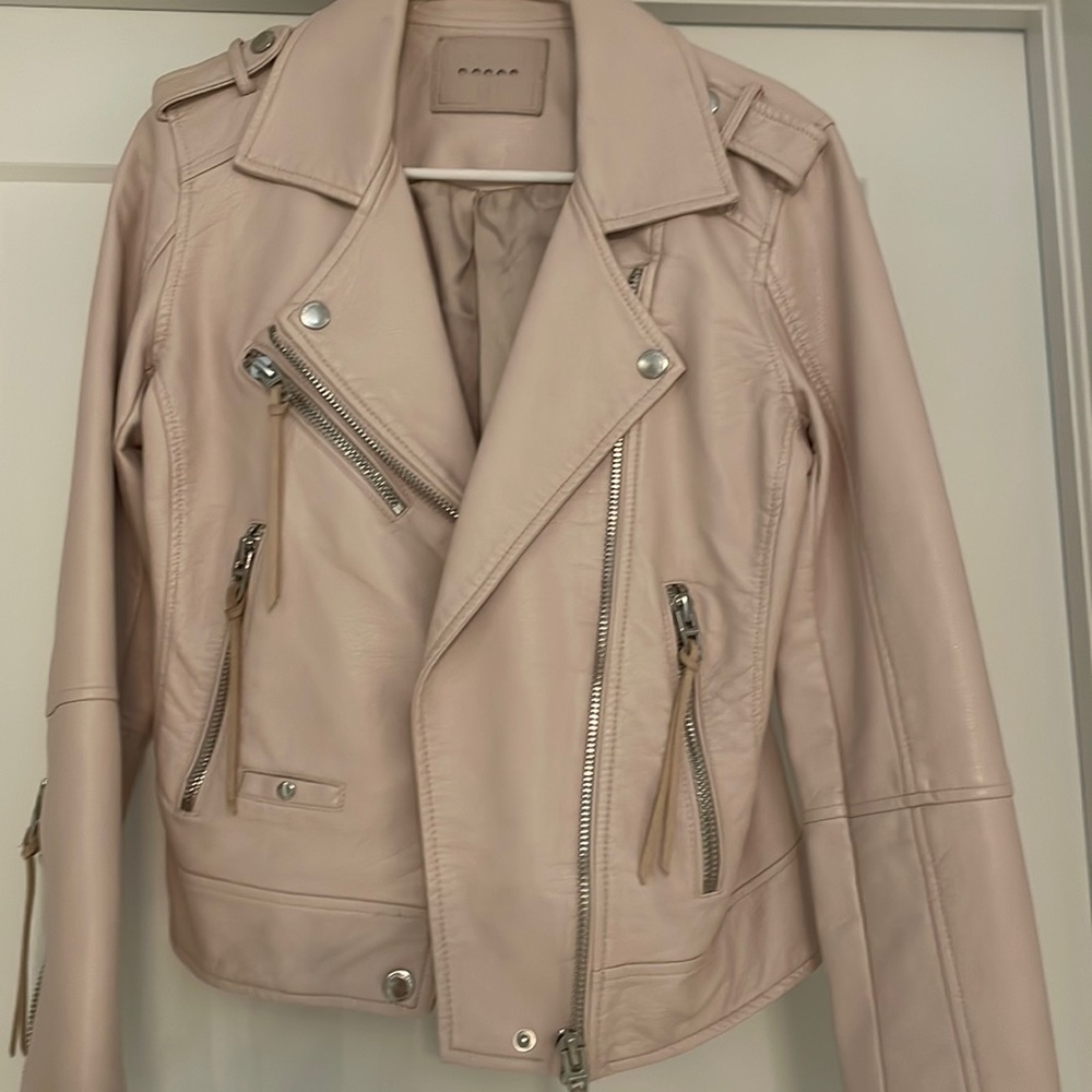 Faux Moto  leather light pink jacket size small with zipper sleeves and pockets